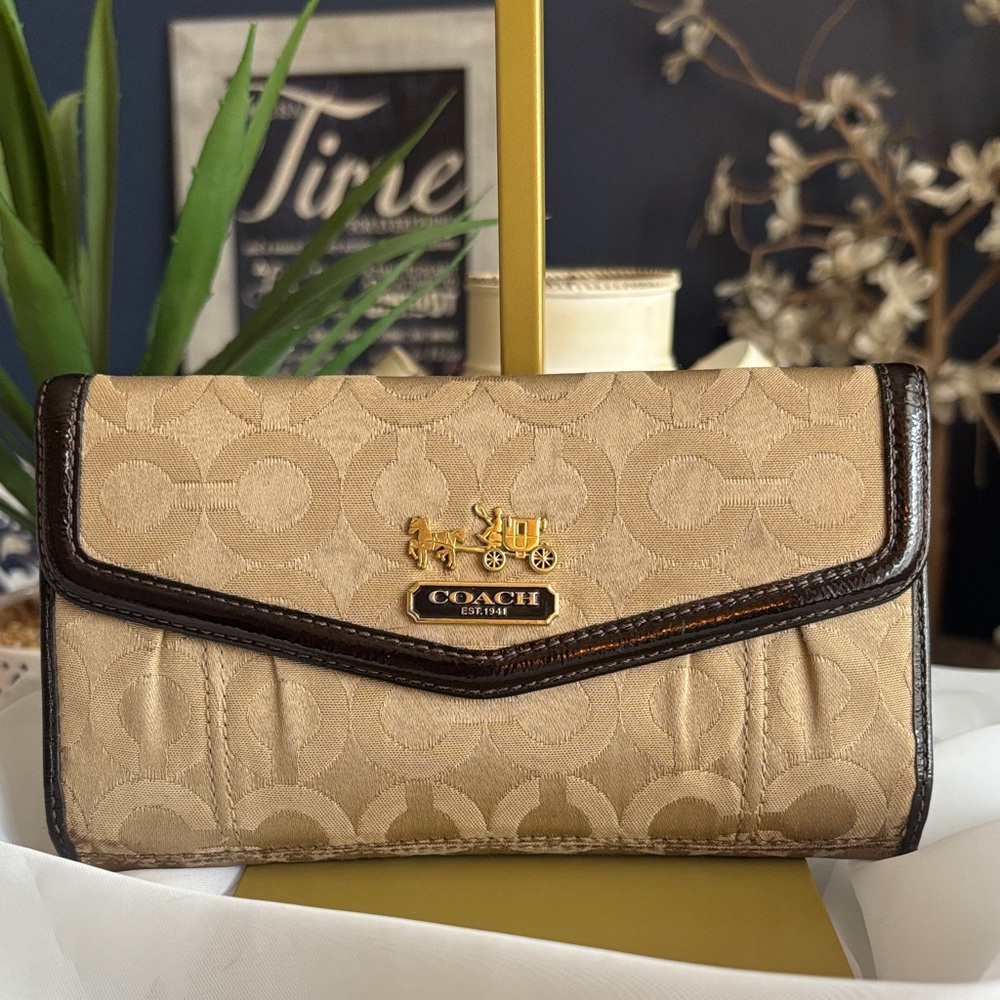 Coach Madison Trifold Wallet featuring the "Op Art" signature jacquard print